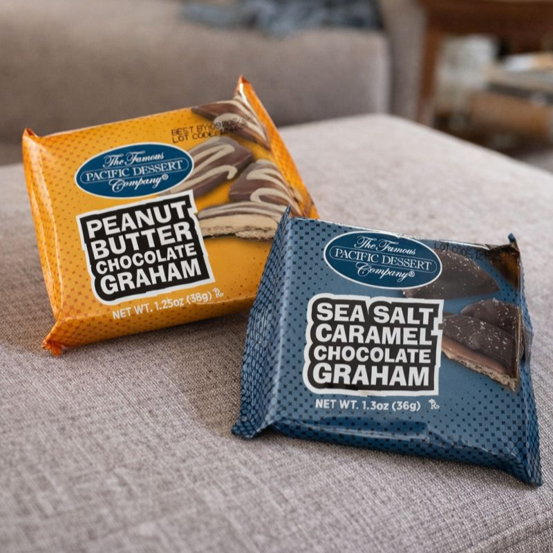 Two packages of chocolate graham crackers.