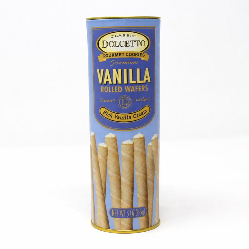 Dolcetto Premium Vanilla Rolled Wafers in a light blue cylindrical tin, showcasing delicately rolled European-style wafers filled with rich vanilla cream, net weight 3 oz.