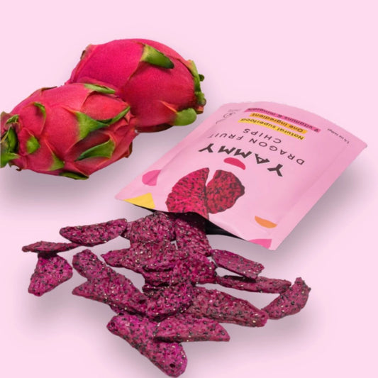 Dragon fruit and dried dragon fruit chips with a pink packaging on a white background