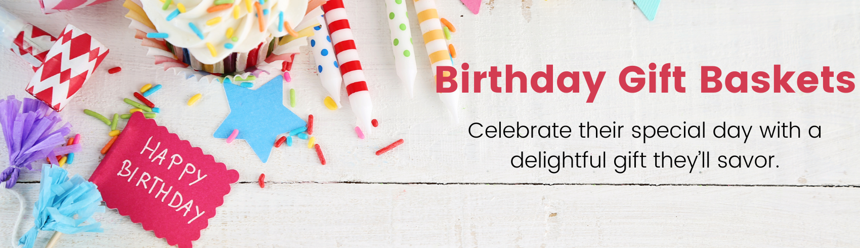 Birthday gift baskets with colorful decorations and a 'Happy Birthday' sign on a white background.