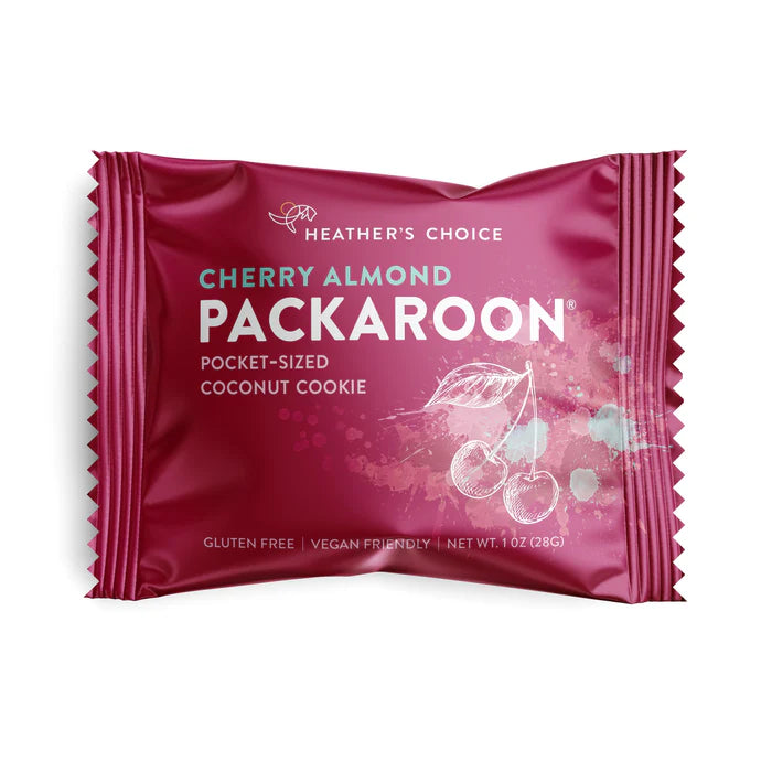 Heather's Choice Cherry Almond Packaroon in magenta wrapper, gluten-free, vegan, 1 oz coconut cookie, ideal for on-the-go snacking.