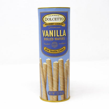 Dolcetto Premium Vanilla Rolled Wafers in a light blue cylindrical tin, showcasing delicately rolled European-style wafers filled with rich vanilla cream, net weight 3 oz.