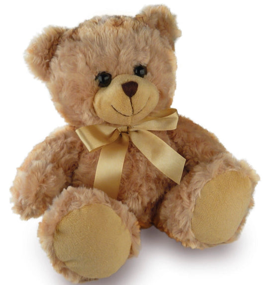 A beige teddy bear with a golden bow ribbon around its neck.