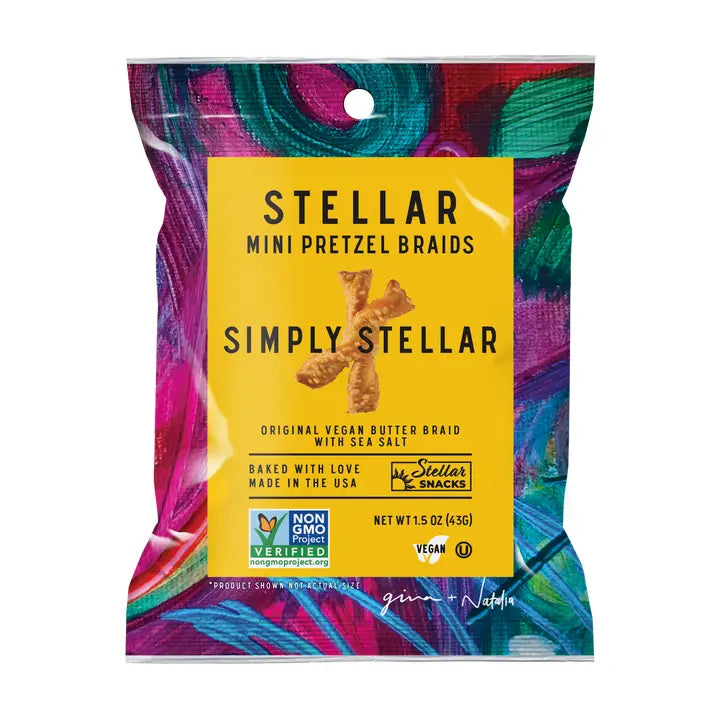 A package of Stellar Mini Pretzel Braids with the flavor 'Simply Stellar' highlighted on the front. The package is colorful with a yellow label and multicolored design, indicating the product is vegan and non-GMO.