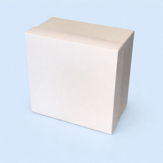 White Gift Box | Choose 6-8 Products: A plain, cube-shaped white cardboard box for customizable gifts, ready to be wrapped with a coordinating ribbon.