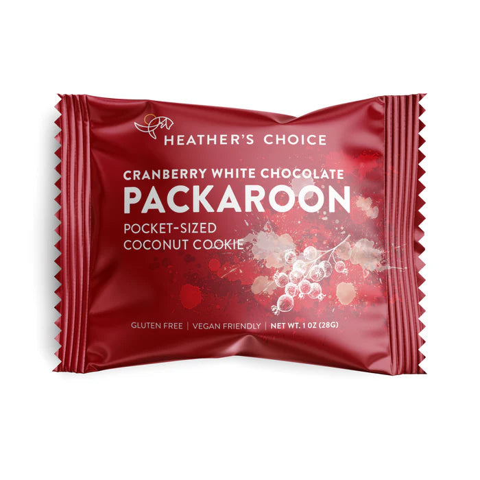 Heather's Choice Packaroons in a red wrapper, labeled as Cranberry White Chocolate Coconut Cookie, gluten-free, vegan, 1 oz. Ideal for on-the-go snacking.